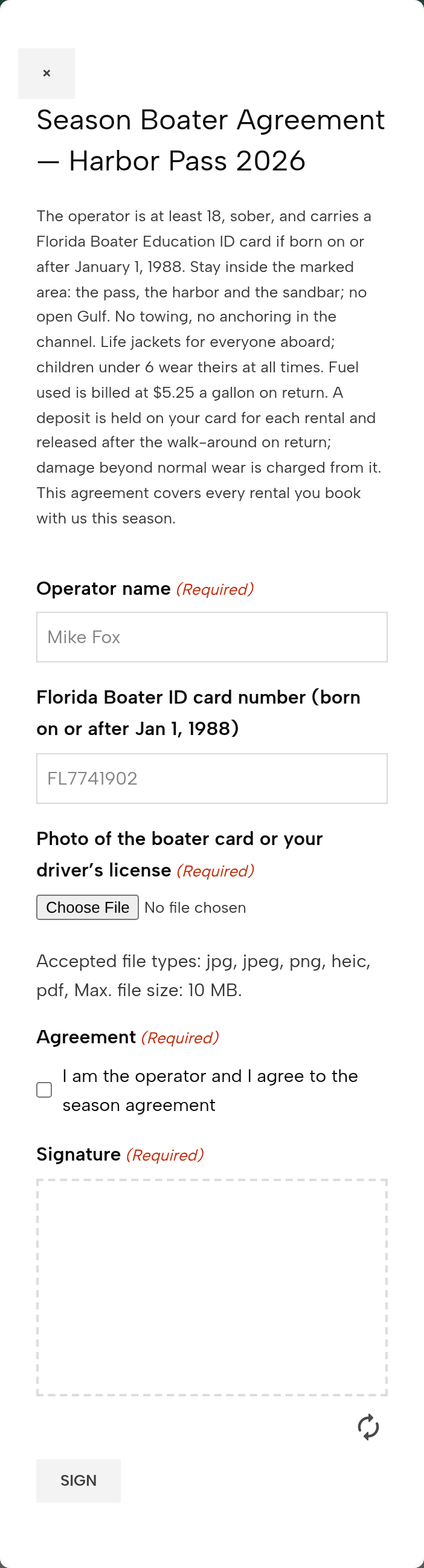 The Season Boater Agreement — Harbor Pass 2026 on a phone: the terms; operator name Mike Fox; Florida Boater ID card number FL7741902; a photo of the boater card or driver’s license; I am the operator and I agree to the season agreement; the signature pad; Sign