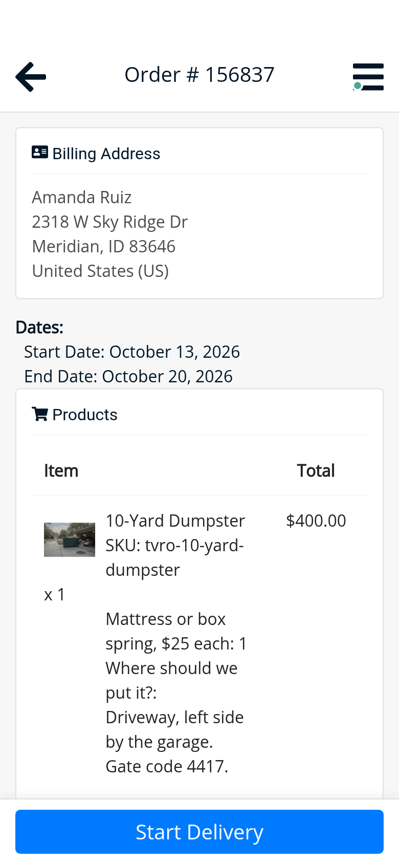 Amanda Ruiz’s stop in the driver app: the address, October 13 to 20, the 10-yard dumpster, one mattress and the note: driveway, left side by the garage, gate code 4417